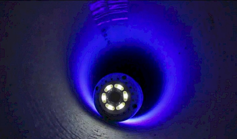 Reabilitação de tubagens com manga de fibra de vidro curada